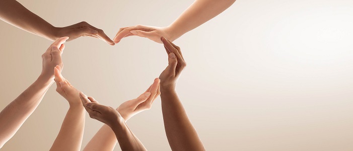 Hands forming the shape of a heart